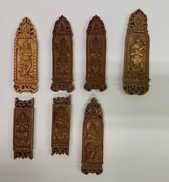 木雕牌飾（暫定名）。國家文物局供圖