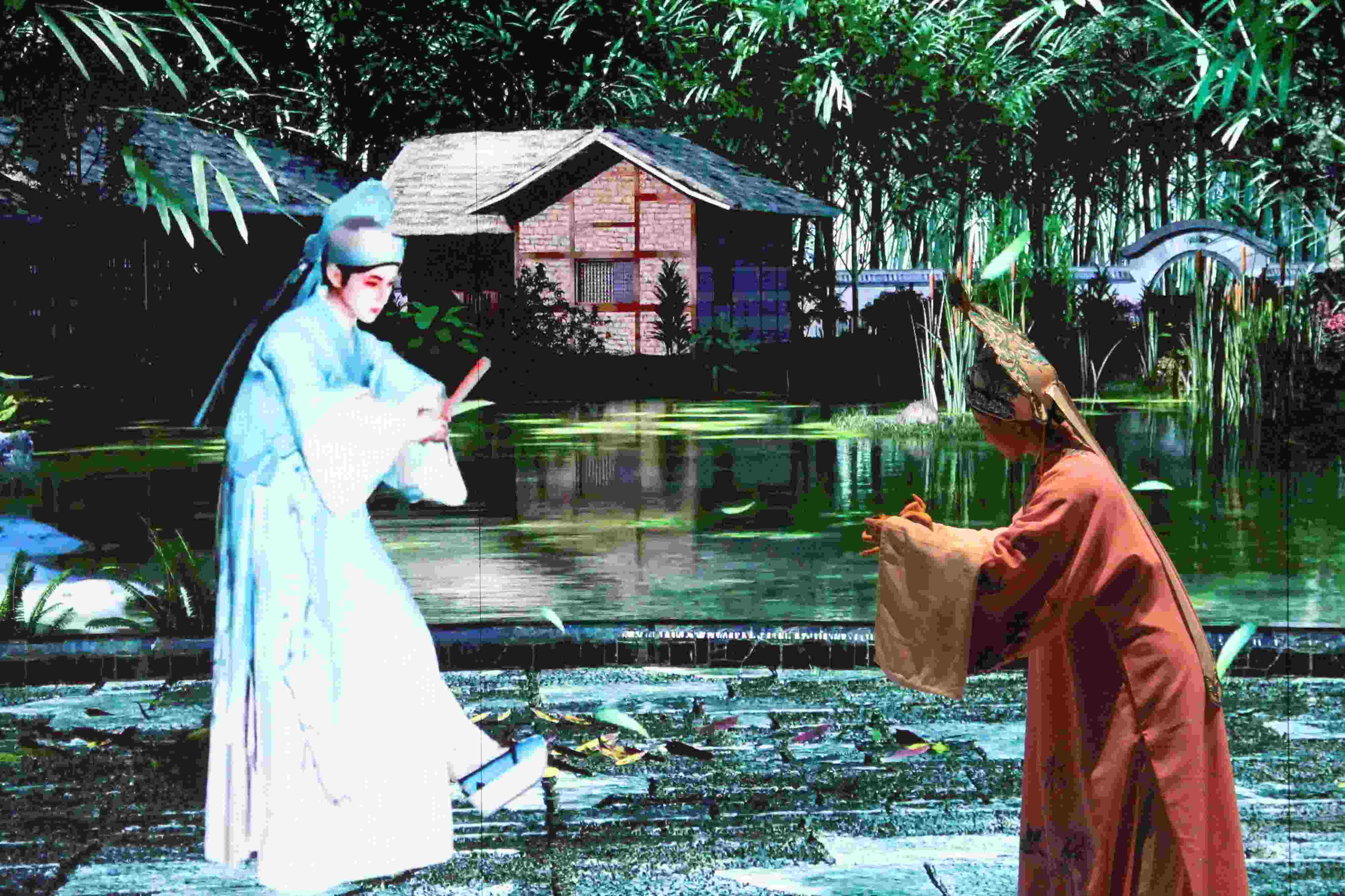 真人演員與虛擬人演員在“元啟金陵”南京數(shù)字文化客廳出演《梁山伯與祝英臺(tái)》經(jīng)典選段。受訪者供圖